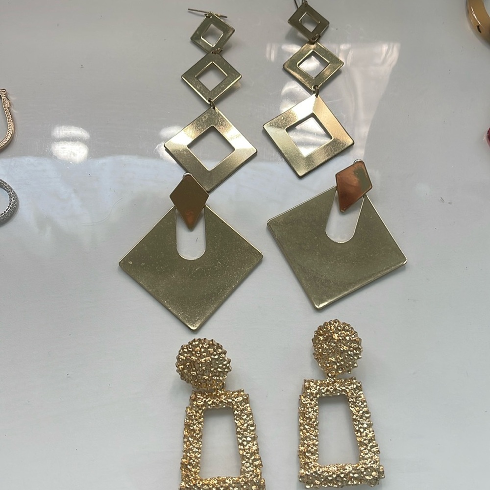 Gold different style earrings